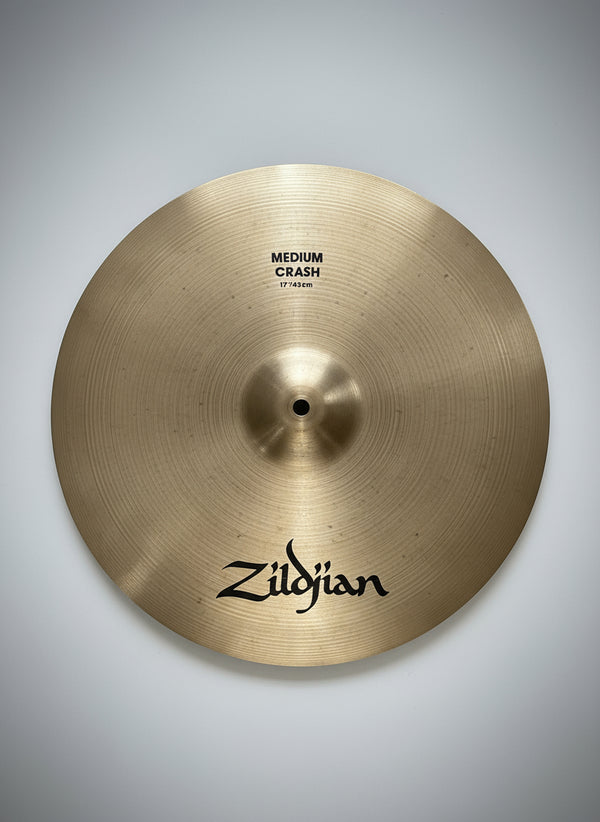 Zildjian cymbal on a textured gray surface