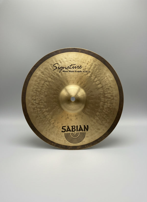 Sabian cymbal on a textured gray surface