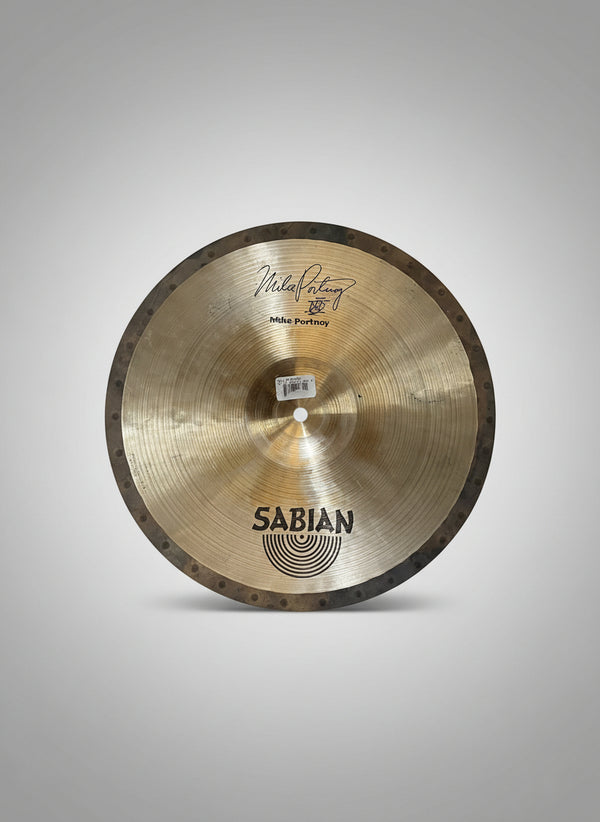 Sabian cymbal on a textured gray surface