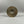 Cymbal on a textured gray surface