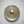 Cymbal on a dark textured surface