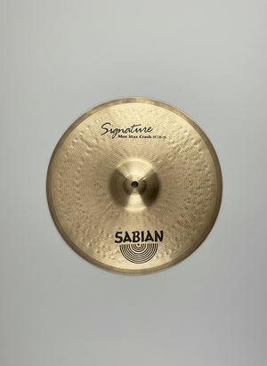 Sabian cymbal on a textured gray surface