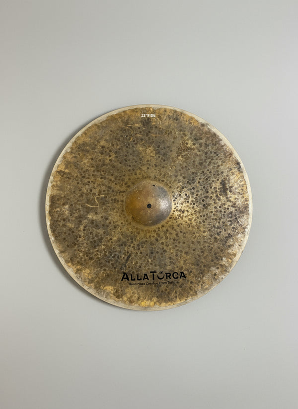 Cymbal with 'Aulturca' branding on a dark background